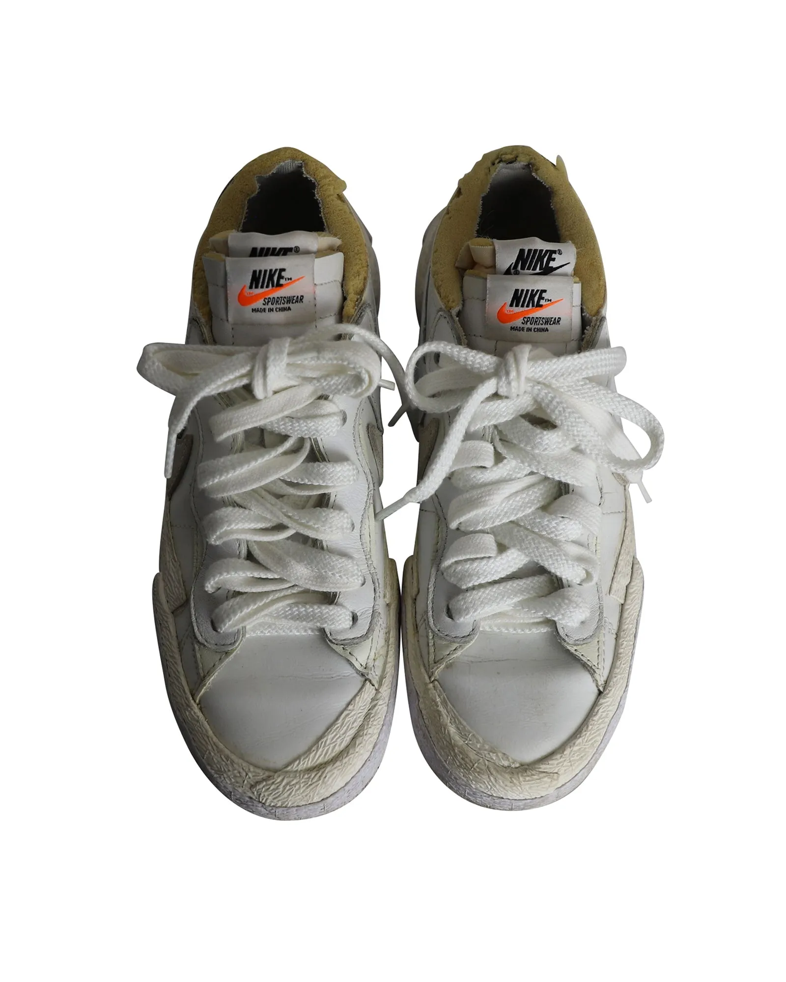 Nike x Sacai Blazer Low Sneakers en cuir verni blanc
