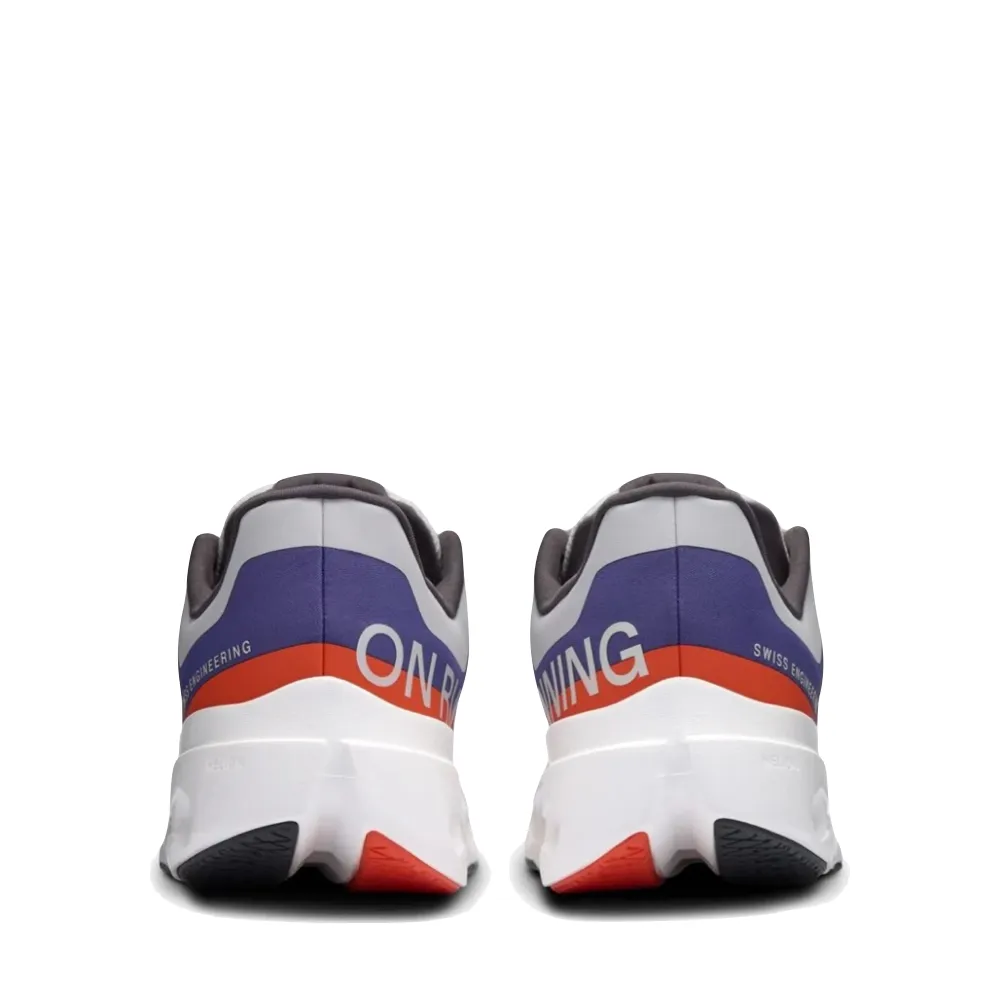 Sur la chaussure Cloudsurfer Next pour hommes en indigo/flamme