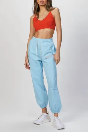 Pantalon de survêtement à imprimé slogan en bleu clair