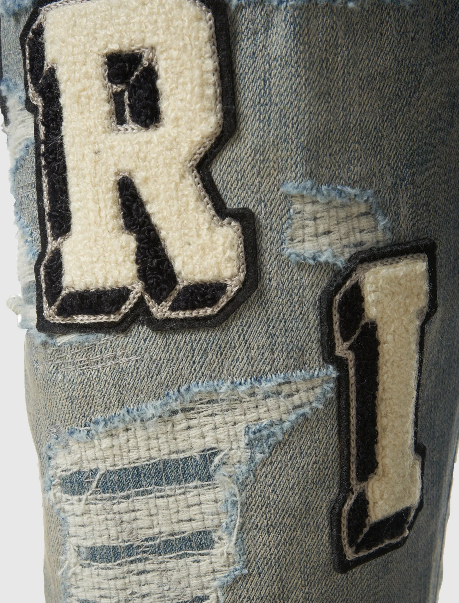 VARSITY JEAN Vêtements	AMIRI